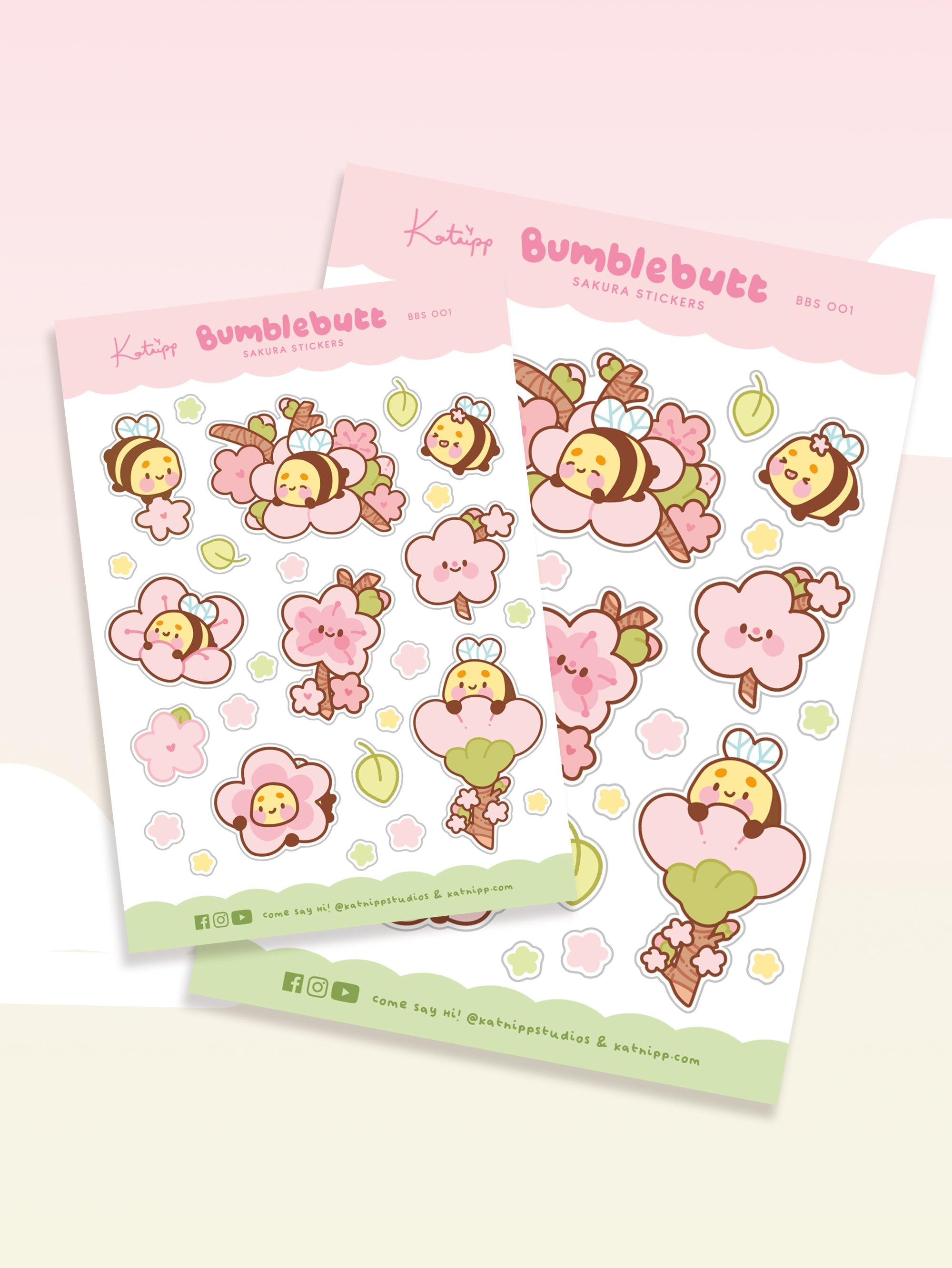 Image of Bumblebutt Sakura planner sticker sheet featuring cute bumblebee surrounded by pink cherry blossoms on vibrant A6 premium paper. 2