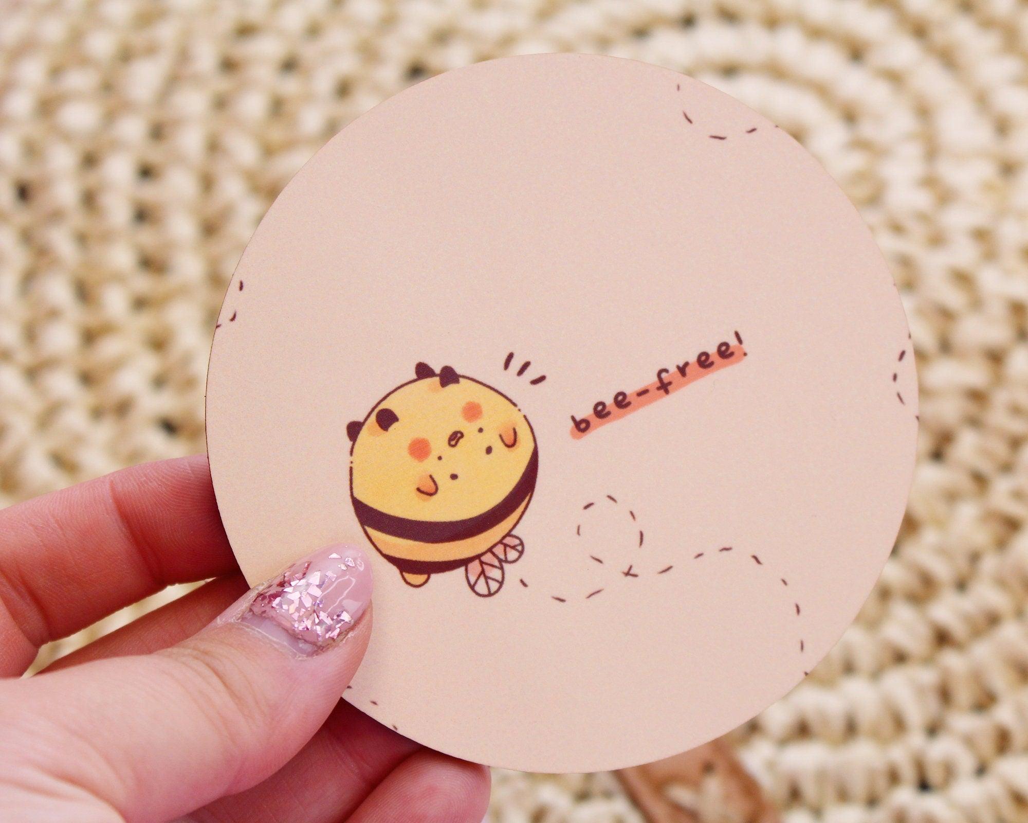 Adorable handprinted MDF coasters featuring original bumblebee illustrations, perfect for adding kawaii buzz to your space. 2