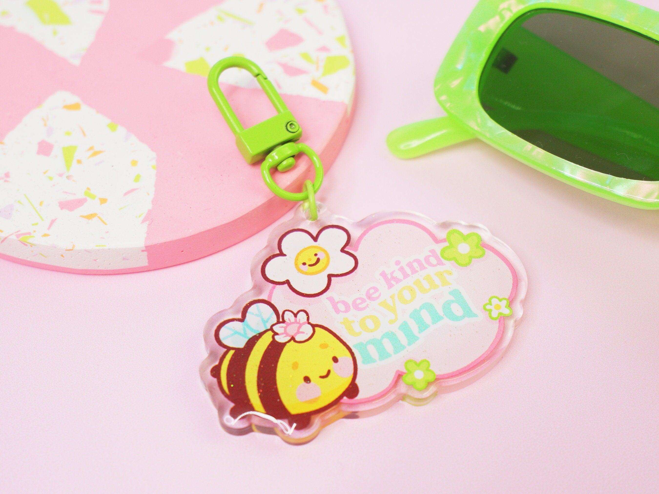 Bumblebutt Acrylic Keyring with double-sided design and glitter epoxy finish, ideal for bags or keys.