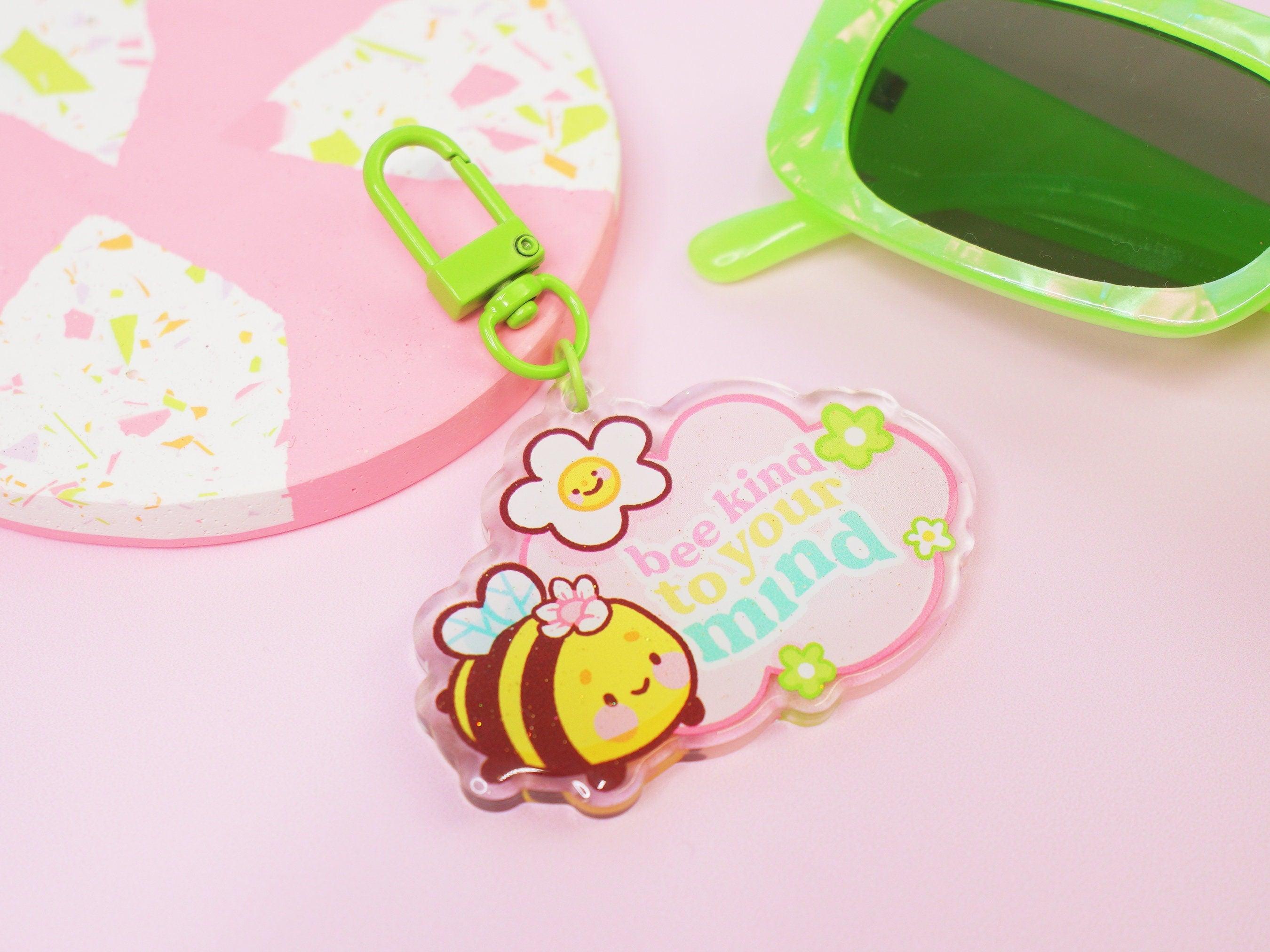 Bumblebutt Acrylic Keyring with double-sided design and glitter epoxy finish, ideal for bags or keys. 2