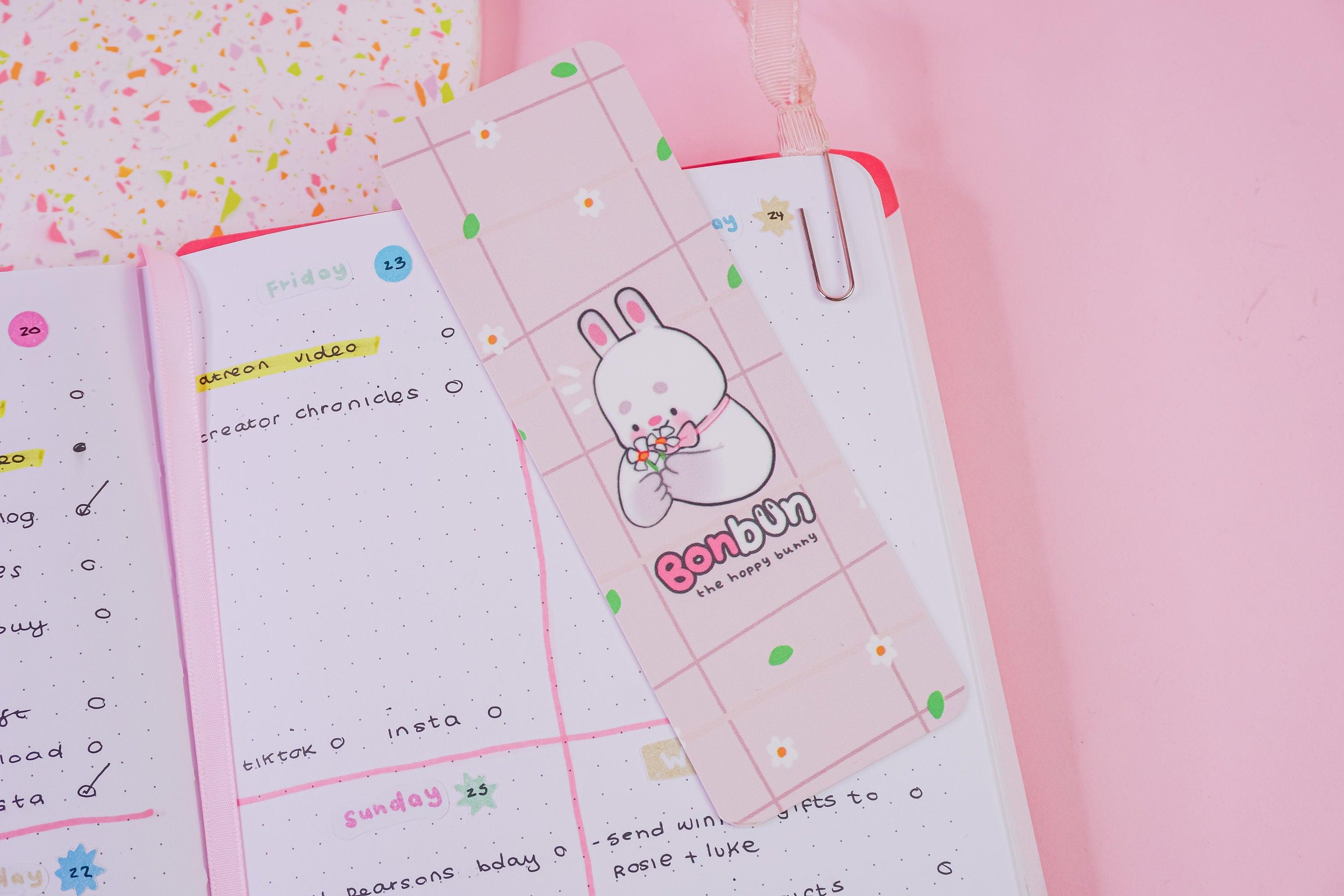Bonbun the Spring Bunny Bookmark - Featuring Bonbun picking flowers on a charming bookmark printed on quality 400gsm cardstock with smooth velvet lamination. 2