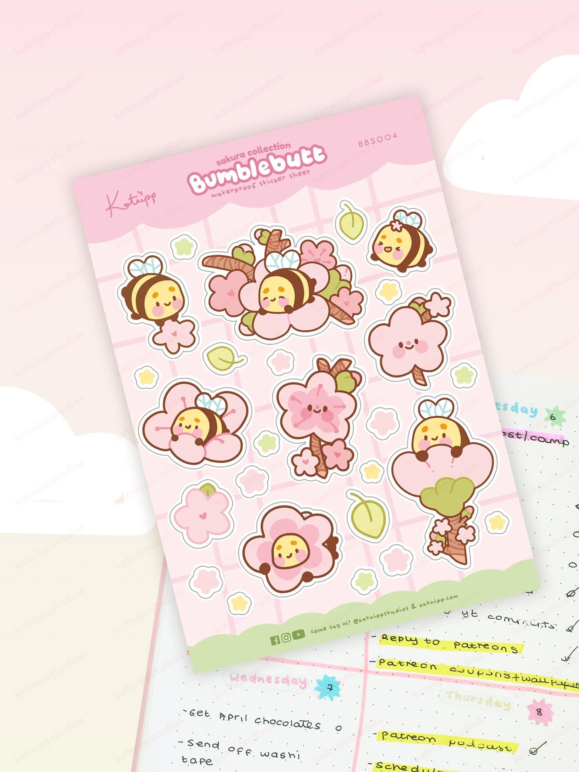 Bumblebutt Sakura A5 sticker sheet featuring cute bumblebee and cherry blossom designs. Waterproof vinyl stickers for planners, journals, and more, main