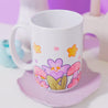 White Glossy Durham mug featuring Bumblebutt the bumble bee in a magical plant scene 2