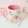 Adorable Bumblebutt Cherry Blossom Mug - Hand-printed white ceramic mug featuring a cute Bumblebutt design surrounded by cherry blossoms. 11