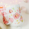 Adorable Bumblebutt Cherry Blossom Mug - Hand-printed white ceramic mug featuring a cute Bumblebutt design surrounded by cherry blossoms. 2