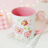 Adorable Bumblebutt Cherry Blossom Mug - Hand-printed white ceramic mug featuring a cute Bumblebutt design surrounded by cherry blossoms. 3