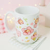 Adorable Bumblebutt Cherry Blossom Mug - Hand-printed white ceramic mug featuring a cute Bumblebutt design surrounded by cherry blossoms. 4