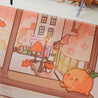 Cosy Autumn Gaming Desk Pad | Kawaii Fall Desk Mat | Pumpkin Café Scene for Cute Workspace Decor - Katnipp Studios