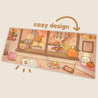 Cosy Autumn Gaming Desk Pad | Kawaii Fall Desk Mat | Pumpkin Café Scene for Cute Workspace Decor - Katnipp Studios