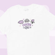 Creepy Chic Gothic Halloween T-Shirt | Kawaii Spooky Aesthetic Tee | Cute Bat & Spider Shirt for Vampies Vault Fans Katnipp character product