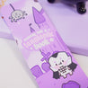 Kawaii Gothic Halloween Bookmark – ‘Sinking into a Fangtastic Book’ - Double-Sided Vinyl Stationery for Spooky Reading - Katnipp Studios