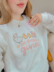 No Ducks Given Kawaii Spring Sweatshirt | Funny Pun Sweater | Cute & Cozy Seasonal Apparel Katnipp character product