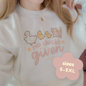 No Ducks Given Kawaii Spring Sweatshirt | Funny Pun Sweater | Cute & Cozy Seasonal Apparel Katnipp character product
