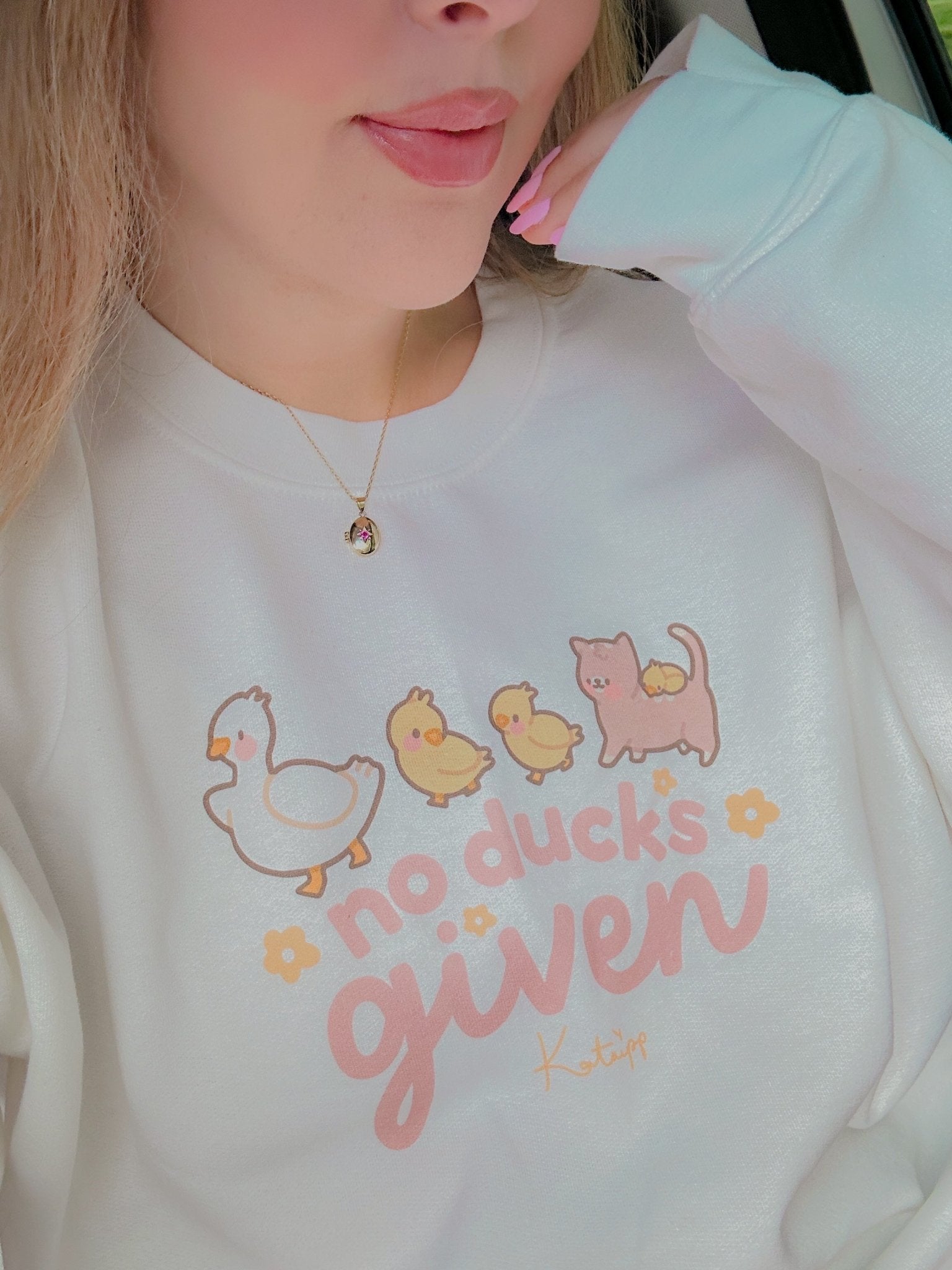 No Ducks Given Kawaii Spring Sweatshirt | Funny Pun Sweater | Cute & Cozy Seasonal Apparel Katnipp character product