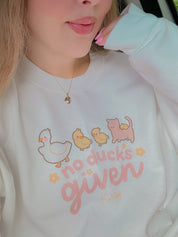 No Ducks Given Kawaii Spring Sweatshirt | Funny Pun Sweater | Cute & Cozy Seasonal Apparel Katnipp character product