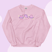 Saturn Cosmic Poses Sweatshirt | Cute Celestial Planet Design Katnipp character product