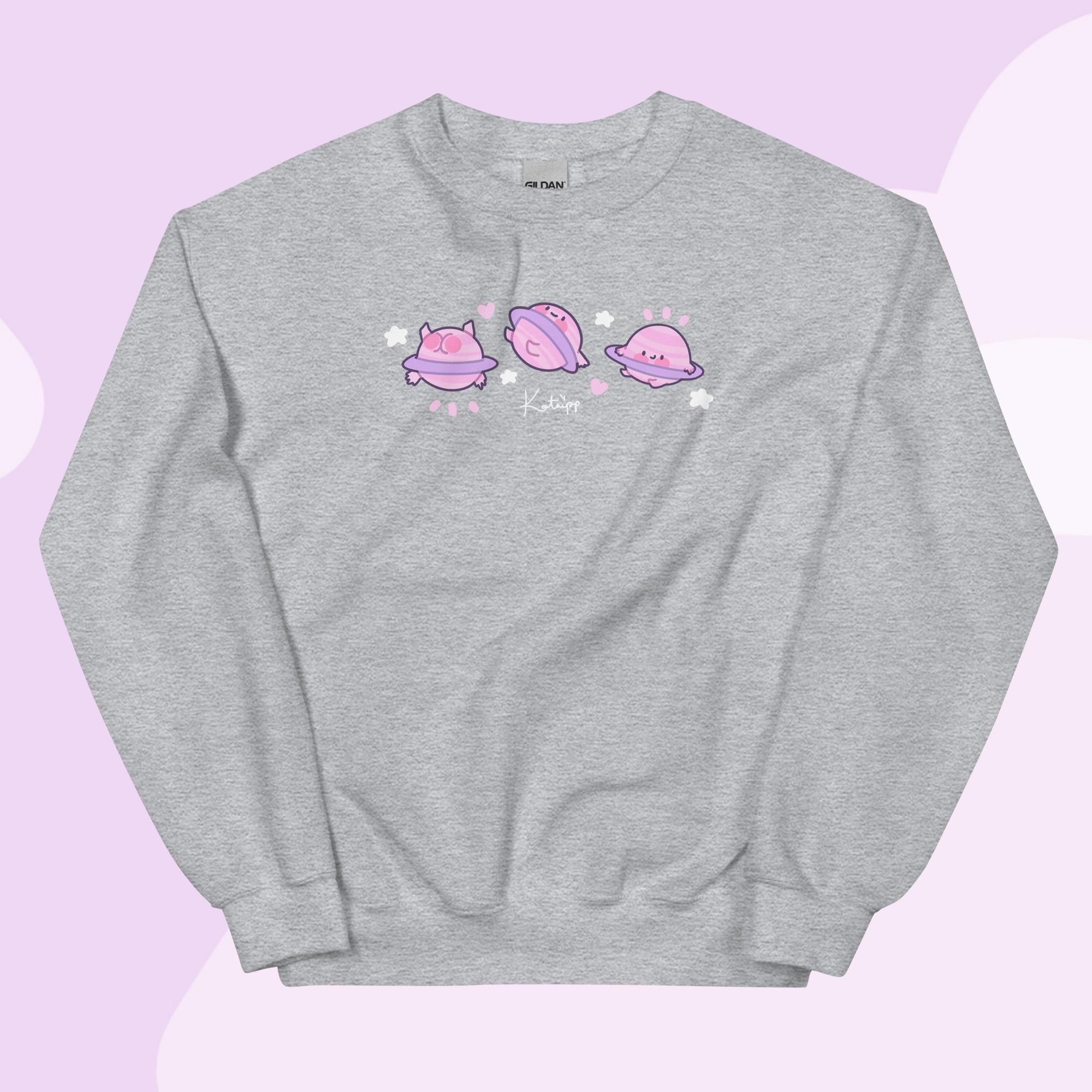 Saturn Cosmic Poses Sweatshirt | Cute Celestial Planet Design Katnipp character product