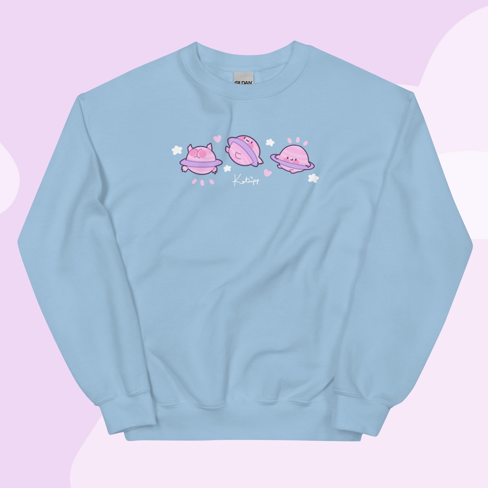Saturn Cosmic Poses Sweatshirt | Cute Celestial Planet Design Katnipp character product