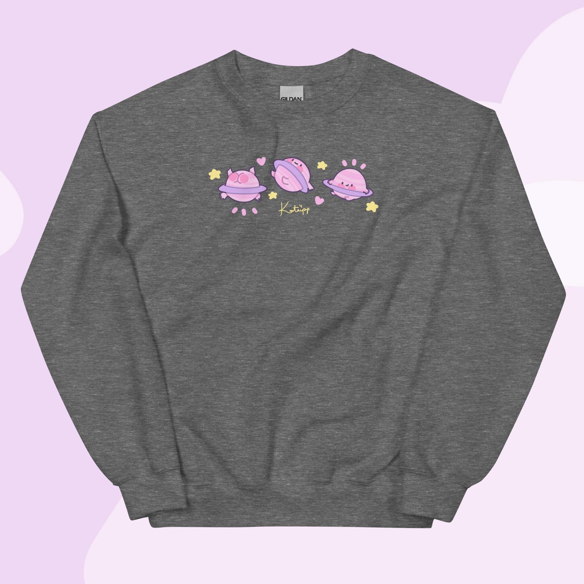 Saturn Cosmic Poses Sweatshirt | Cute Celestial Planet Design Katnipp character product