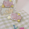 Spring Ducks and Daffodils: Satsuma the Cat & Spring Ducklings Kawaii Enamel Pin - Katnipp Studios