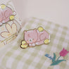 Spring Ducks and Daffodils: Satsuma the Cat & Spring Ducklings Kawaii Enamel Pin - Katnipp Studios