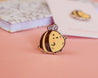 Enamel pin featuring a cute bumble bee design, perfect for jackets, bags, and clothing. 5